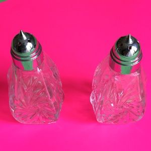 Set of glass salts and pepper shakers